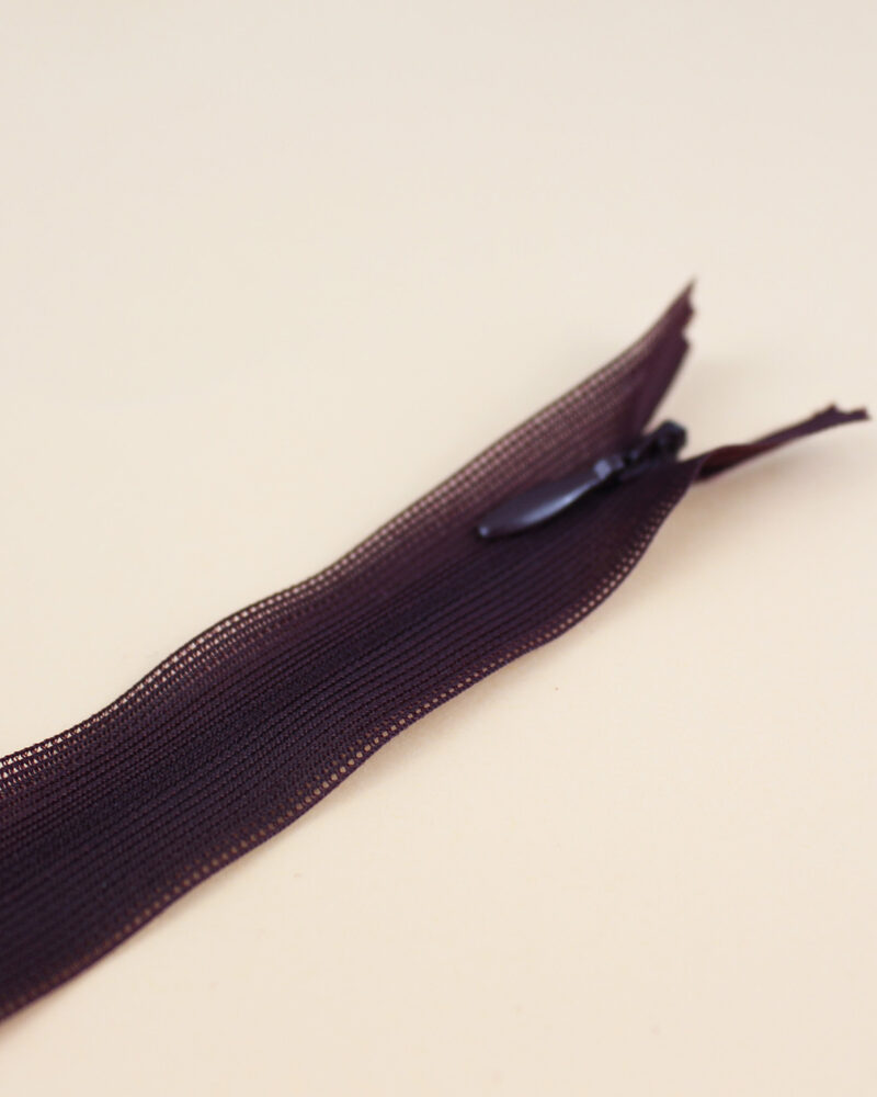 Zip invisible lie de vin
