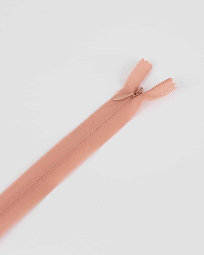 Zip invisible nude rosé