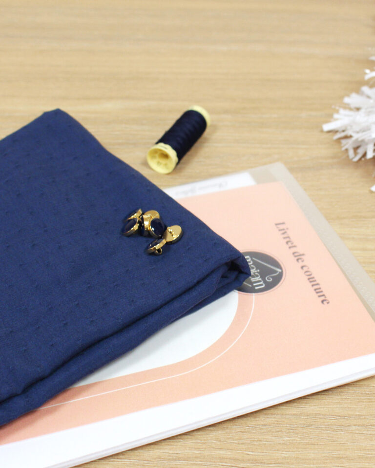 Tissu jersey polyester bleu marine imprimé feuillages